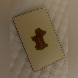 ID holder by Radley London.  Super cute and sleek to hold your ID or credit card